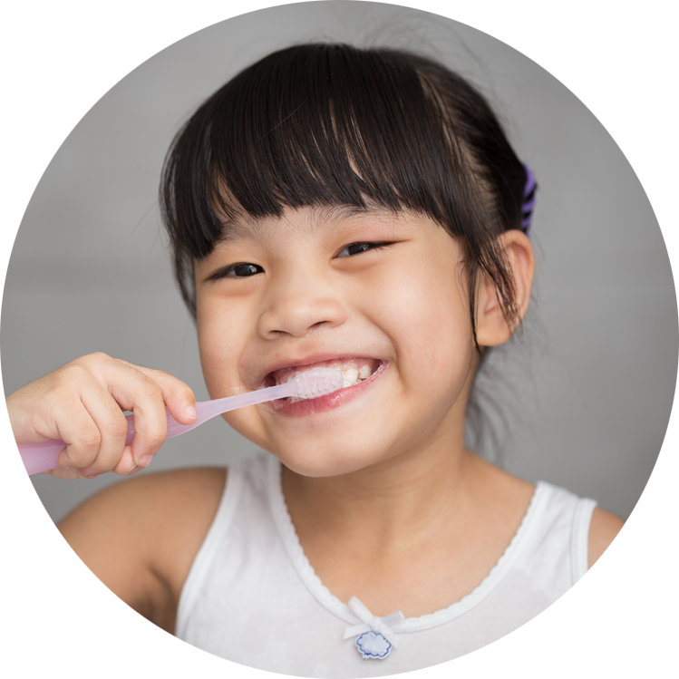 young dental patient brushing teeth